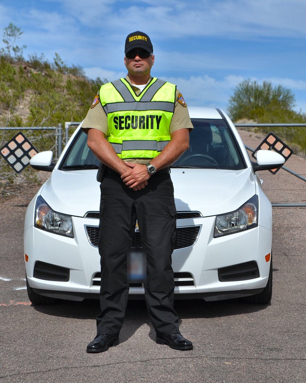 SecureOne security officer on vehicle patrol